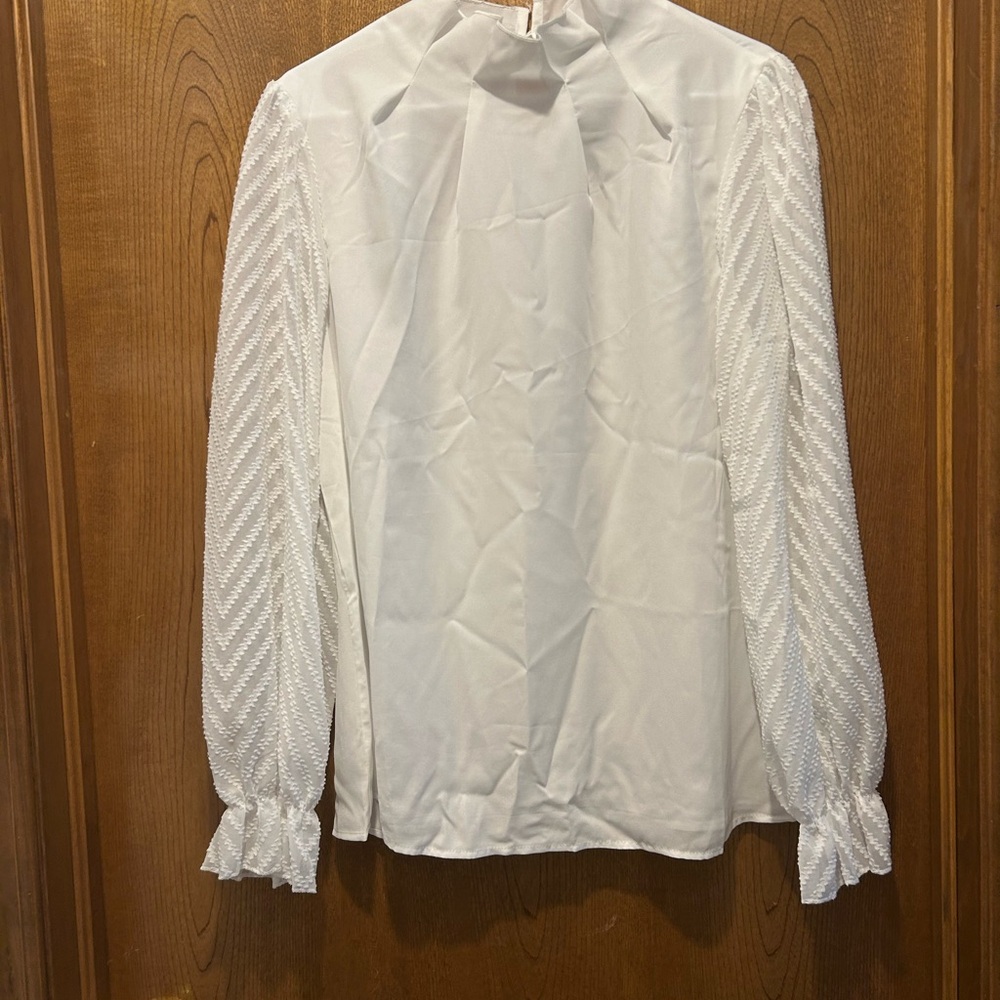 Elegant White Blouse with Textured Sleeves